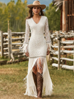 White lace V-neck maxi dress by FJØRNA, elegant evening dress with delicate lace details and flowing silhouette.