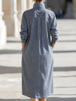 FJØRNA midi dress for women, stylish and flowy, featuring a fitted bodice and flared skirt, perfect for casual or semi-formal wear.