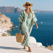Loose summer long kaftan dress for women by FJØRNA, featuring flowy fabric and relaxed fit perfect for warm weather.