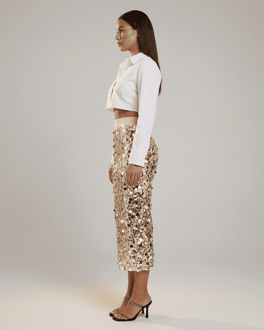 FJØRNA sequin high-waist bodycon midi skirt for women, elegant evening pencil skirt with shimmering sequins and fitted silhouette.