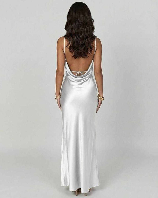 Celadon green satin maxi dress by FJØRNA featuring a V-neck, high slit, and elegant asymmetrical design.