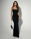 FJØRNA black satin bodycon maxi dress with sleek stretch fabric and subtle animal print for elegant evening wear.