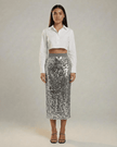 FJØRNA sequin bodycon midi skirt for women, high waist, grey elegant evening fashion, close-up of the shiny, fitted skirt.