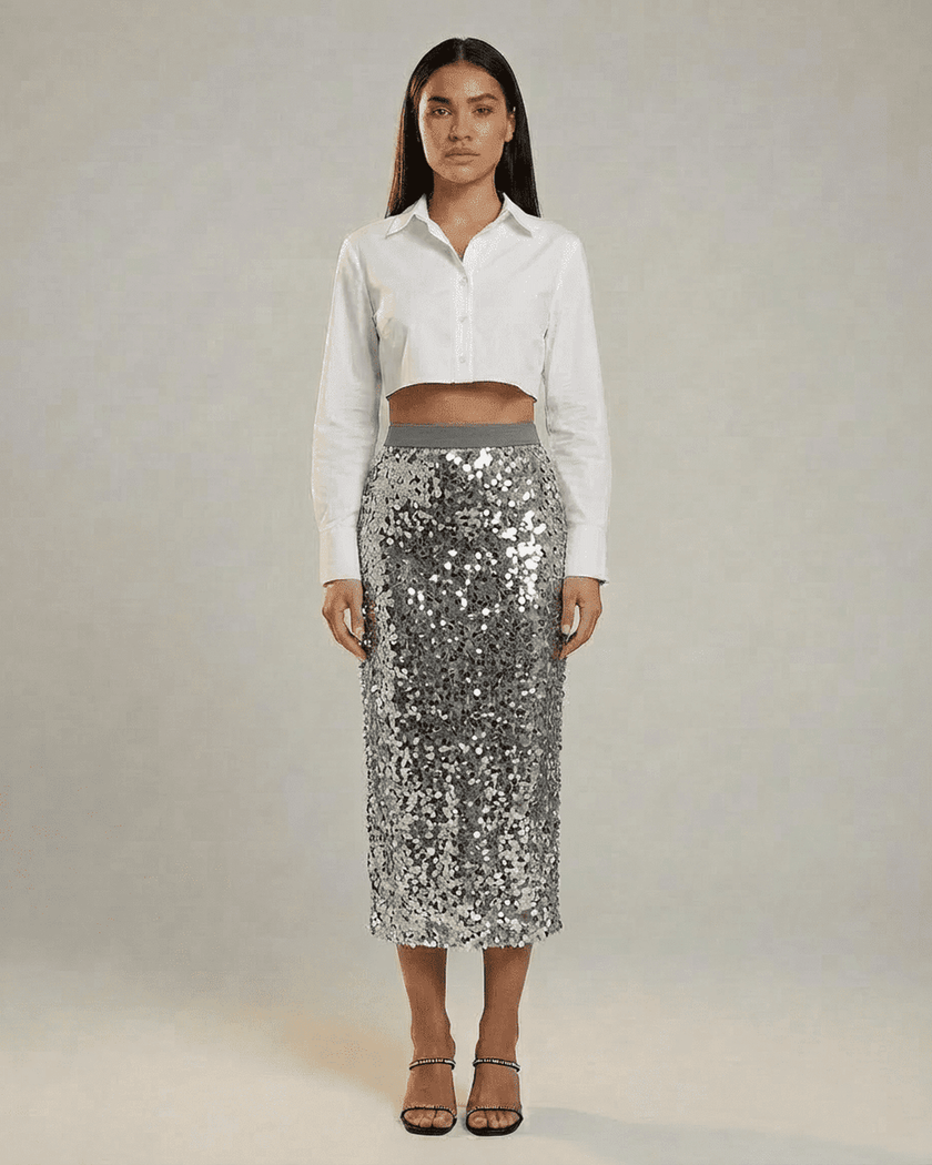 FJØRNA sequin bodycon midi skirt for women, high waist, grey elegant evening fashion, close-up of the shiny, fitted skirt.