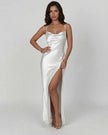 Celadon green satin maxi dress with V-neck, high slit, and sleek silhouette, perfect for elegant evening wear by FJØRNA