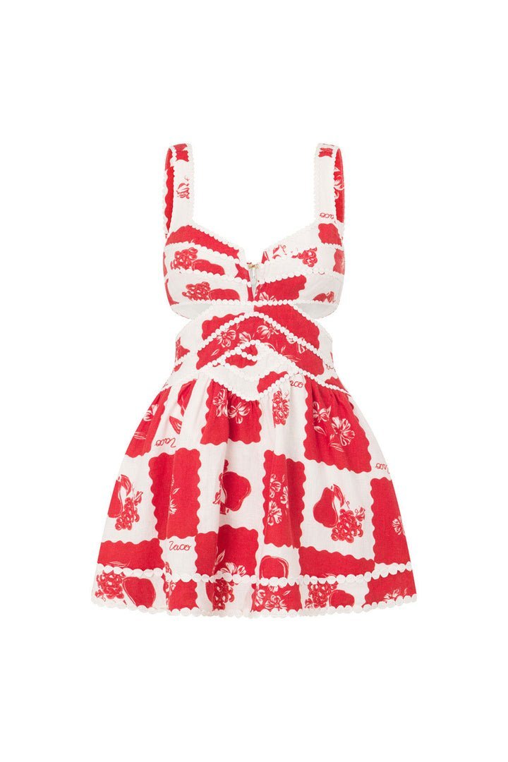 FJØRNA Leila printed cut-out mini dress in white, featuring a stylish design with cut-outs and floral print.