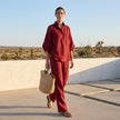 FJØRNA elegant two-piece women's co-ord set featuring a button-front top and matching pants in a stylish lifestyle setting.