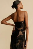 FJØRNA Lindsay floral printed one-shoulder white maxi dress with a flowing silhouette and elegant floral pattern.