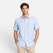 Men's FJØRNA linen shirt with short sleeves, breathable cotton blend fabric, featuring a button-up style for comfortable wear.