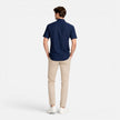 Men's FJØRNA linen shirt with short sleeves, breathable cotton blend fabric, button-up design, ideal for warm weather.