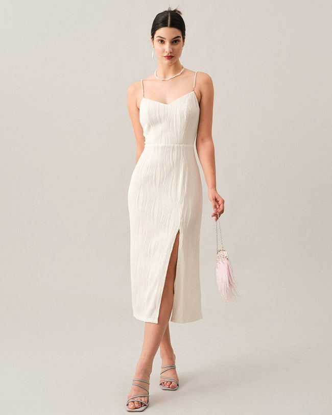 White pearl-strap textured midi dress by FJØRNA, stylish occasion dress with elegant wave pattern and sophisticated design.