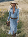 FJØRNA tassel midi dress with flowing fabric and casual style, featuring tassel details at the hem and a relaxed fit.