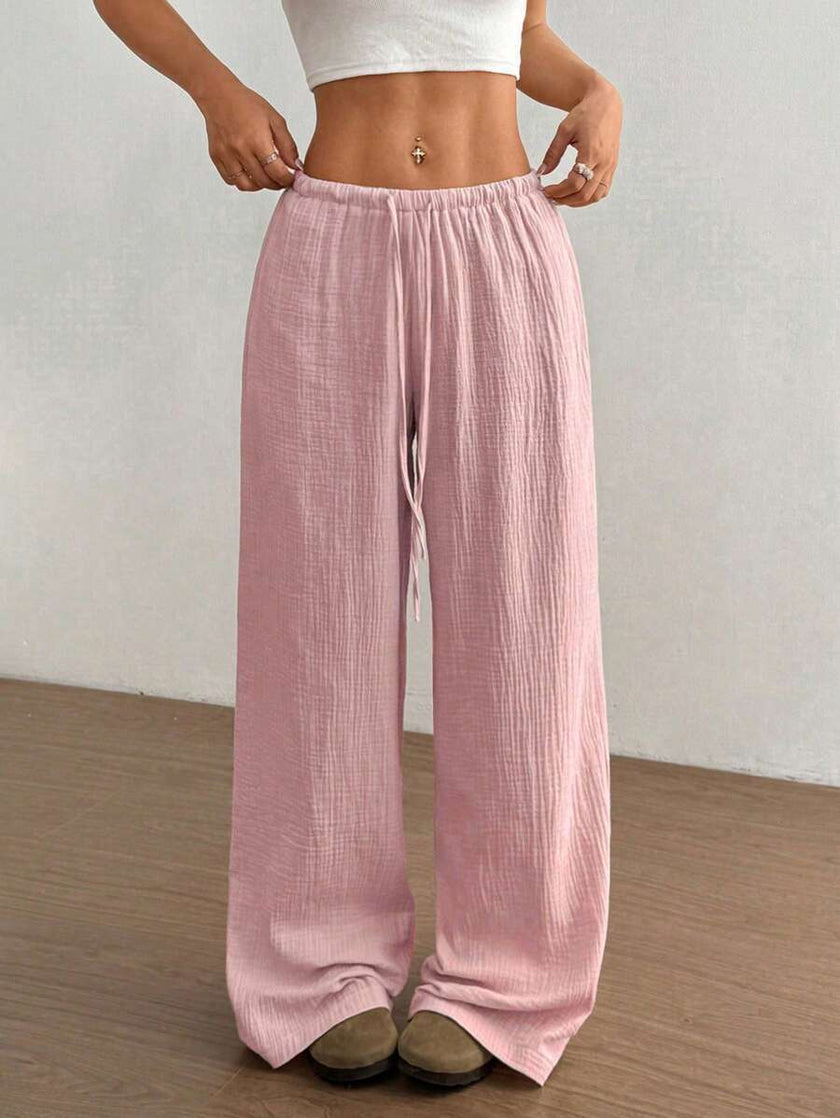 FJØRNA women's lightweight summer trousers with wide leg, drawstring waist, and elastic waistband, casual and comfortable fit.