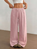 FJØRNA women's lightweight summer trousers with wide leg, drawstring waist, elastic band, casual style, beige fabric.
