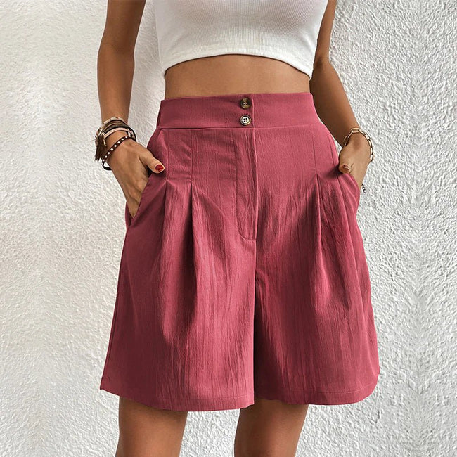 FJØRNA women's lightweight summer shorts with high waist and wide-leg design, shown in soft fabric on a neutral background.