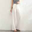 FJØRNA women's lightweight summer trousers with high waist, wide-leg fit, and button front detail