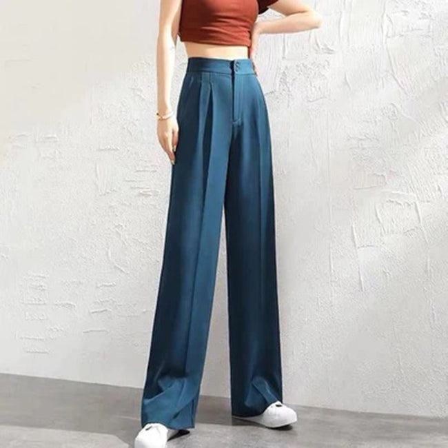 FJØRNA women's lightweight summer trousers with high waist and wide-leg design, featuring a button front detail.