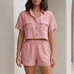 Pink summer two-piece women's co-ord set with button front top and matching shorts by FJØRNA.
