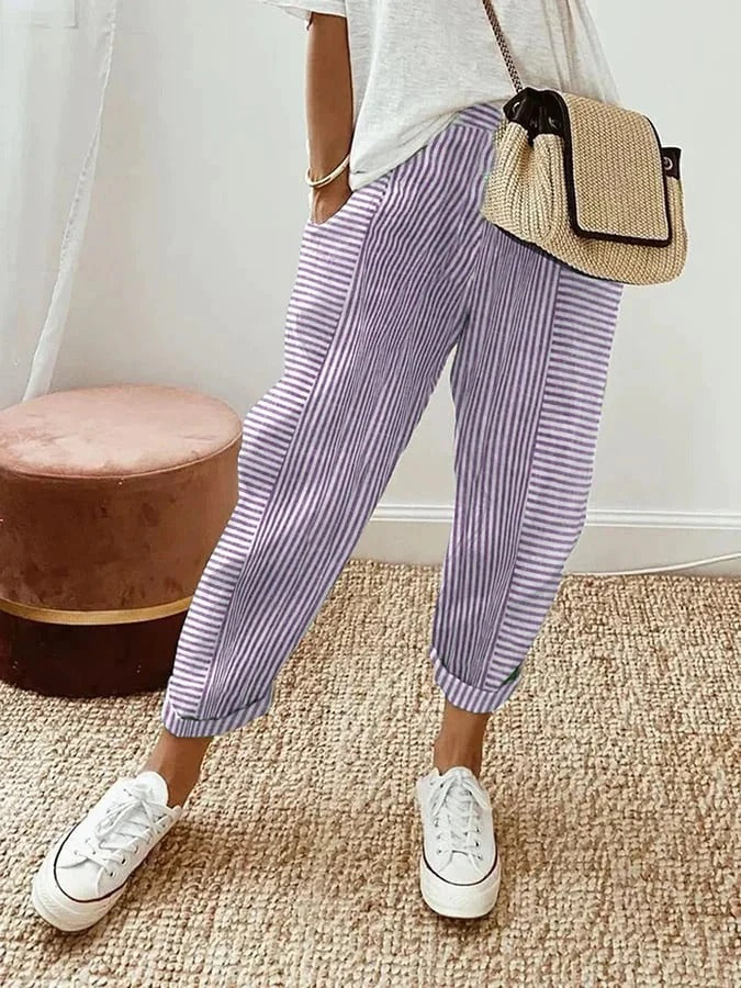 FJØRNA lightweight purple women's summer trousers with straight leg fit and drawstring waist, casual and comfortable for warm weather.