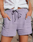 FJØRNA lightweight summer women's shorts with wide leg design and drawstring waist, casual and breathable for warm weather.