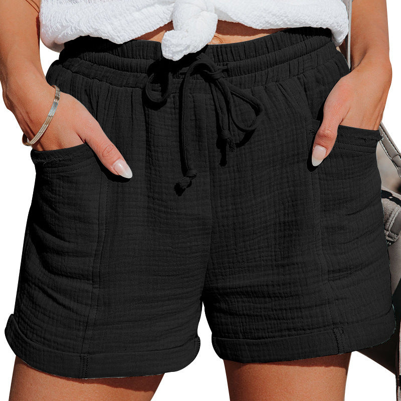 FJØRNA lightweight summer women's shorts with wide leg and drawstring waistband, casual and breathable for warm weather.