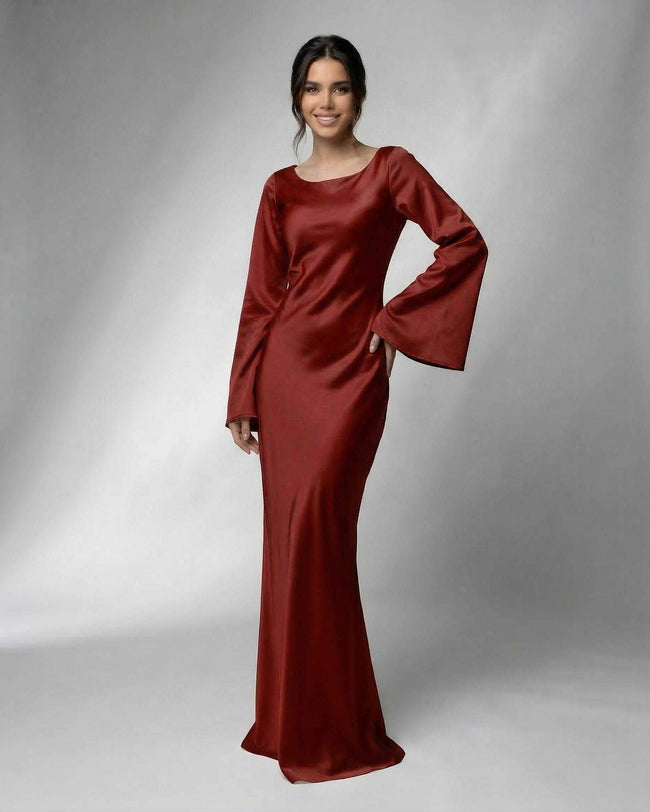 Black satin maxi dress for women by FJØRNA with elegant bell sleeves and a luxurious, floor-length design.