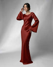 Elegant black satin maxi dress for women by FJØRNA featuring bell sleeves, form-fitting silhouette, and luxurious fabric.