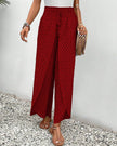 Red lightweight summer trousers for women by FJØRNA, wide-leg and breathable, perfect for warm weather and casual wear.