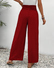 Red FJØRNA women's lightweight summer trousers with wide leg design, breathable fabric, perfect for warm weather.