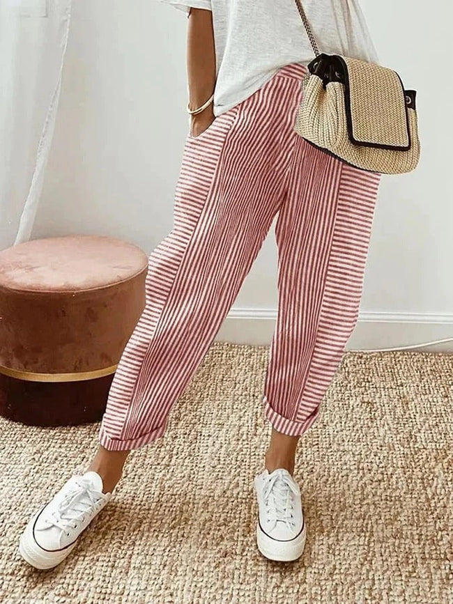 Red lightweight summer women's trousers by FJØRNA featuring a straight leg design and drawstring waist.