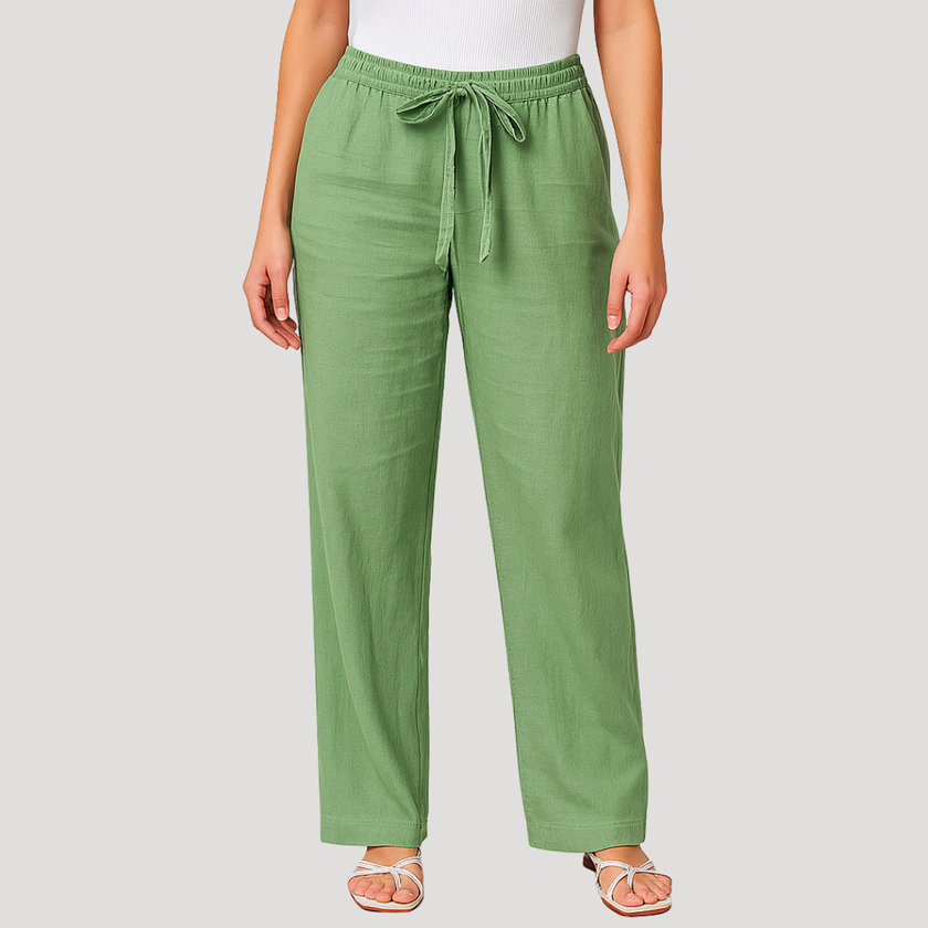 FJØRNA women's lightweight summer trousers with wide legs, drawstring waist, and side pockets, made for casual comfort.