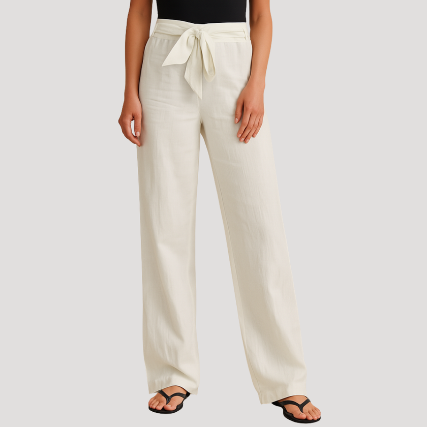 FJØRNA women's lightweight summer trousers with wide legs, drawstring waist, and pockets, perfect for casual warm-weather wear.