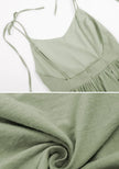 Sage green boho maxi dress by FJØRNA featuring flowing fabric and bohemian style, perfect for casual or summer wear.