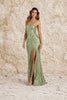 Sage green floral dress by FJØRNA, featuring a flowing design with floral patterns and long sleeves.