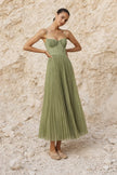 Sage green pleated midi dress from FJØRNA featuring a flowing silhouette and elegant pleats.