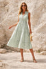 Sage green striped midi dress by FJØRNA featuring a flowing silhouette and elegant design, perfect for casual or semi-formal wear.