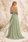 FJØRNA sage green multiway convertible dress with multiple wearing styles, displayed as a versatile, elegant dress on a mannequin.