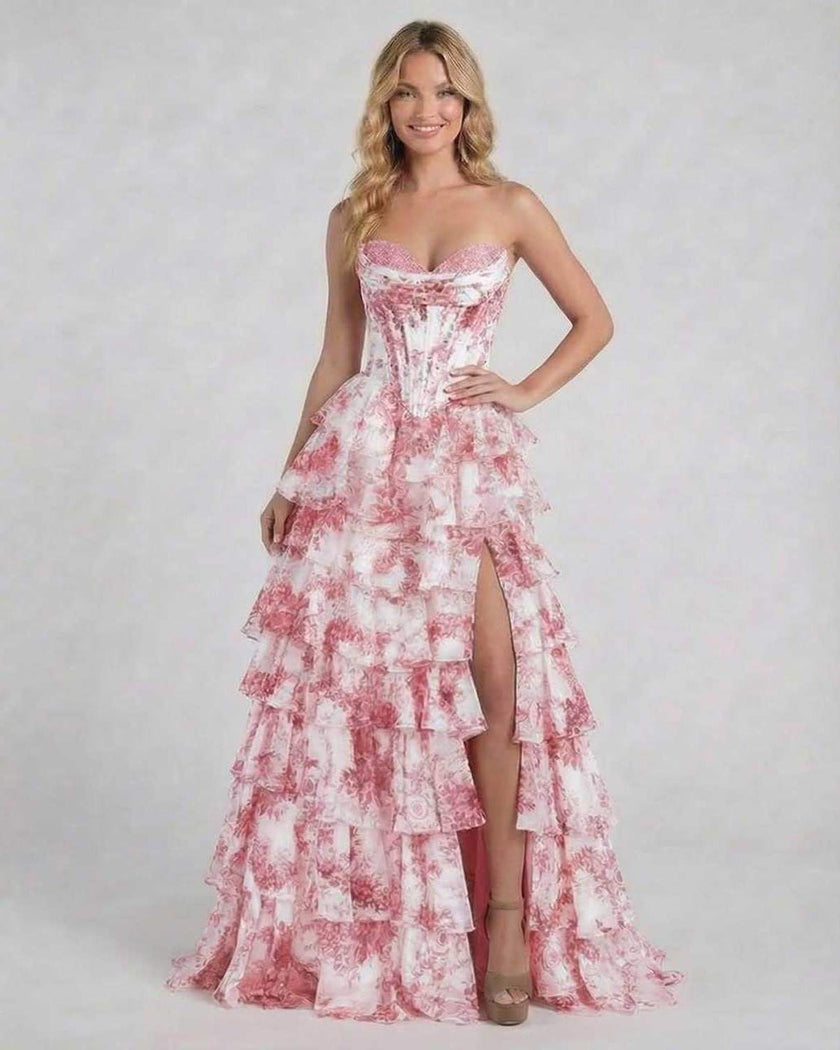 Pink floral tiered chiffon maxi dress by FJØRNA featuring a corset style, perfect for wedding guests and elegant occasions.