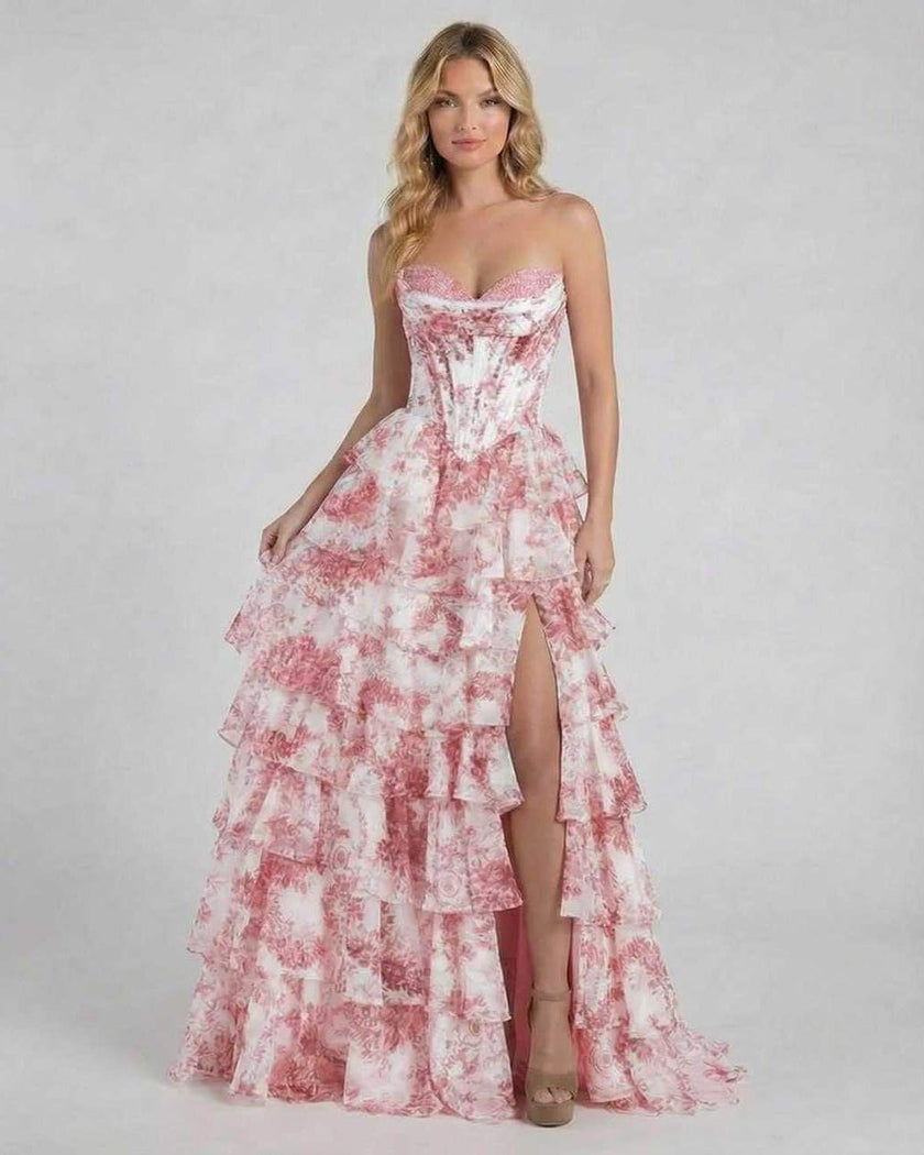Pink floral tiered chiffon maxi dress with structured corset from FJØRNA, perfect for wedding guests and elegant occasions.