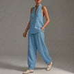 Sky blue FJØRNA women's two-piece co-ord set with V-neck top and matching pants, featuring side pockets, perfect for summer.