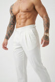 Men's tailored white trousers by FJØRNA, featuring a slim fit design and classic style, shown on a model front view.
