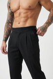 Men's black tailored trousers by FJØRNA, featuring a slim fit design and classic style, shown on a mannequin.