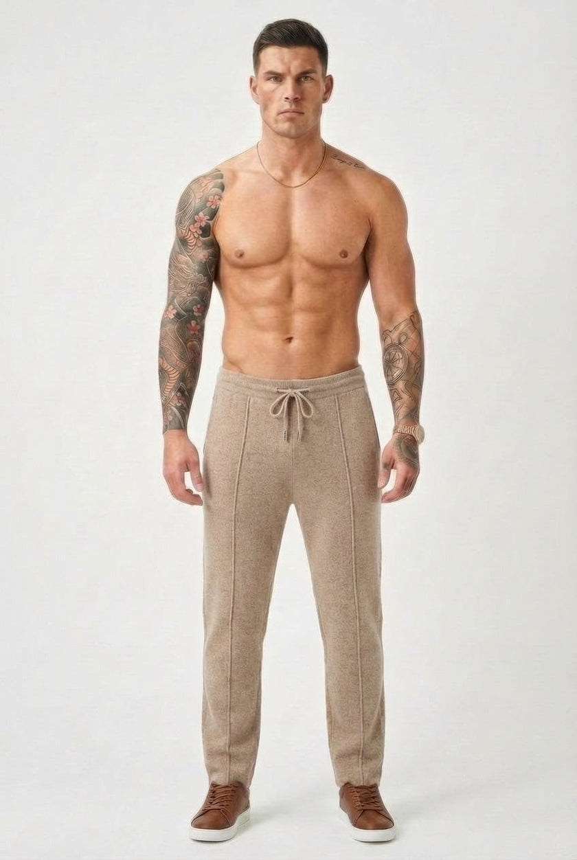 Men's beige Merino wool trousers by FJØRNA, showcasing a tailored fit and smooth fabric texture.