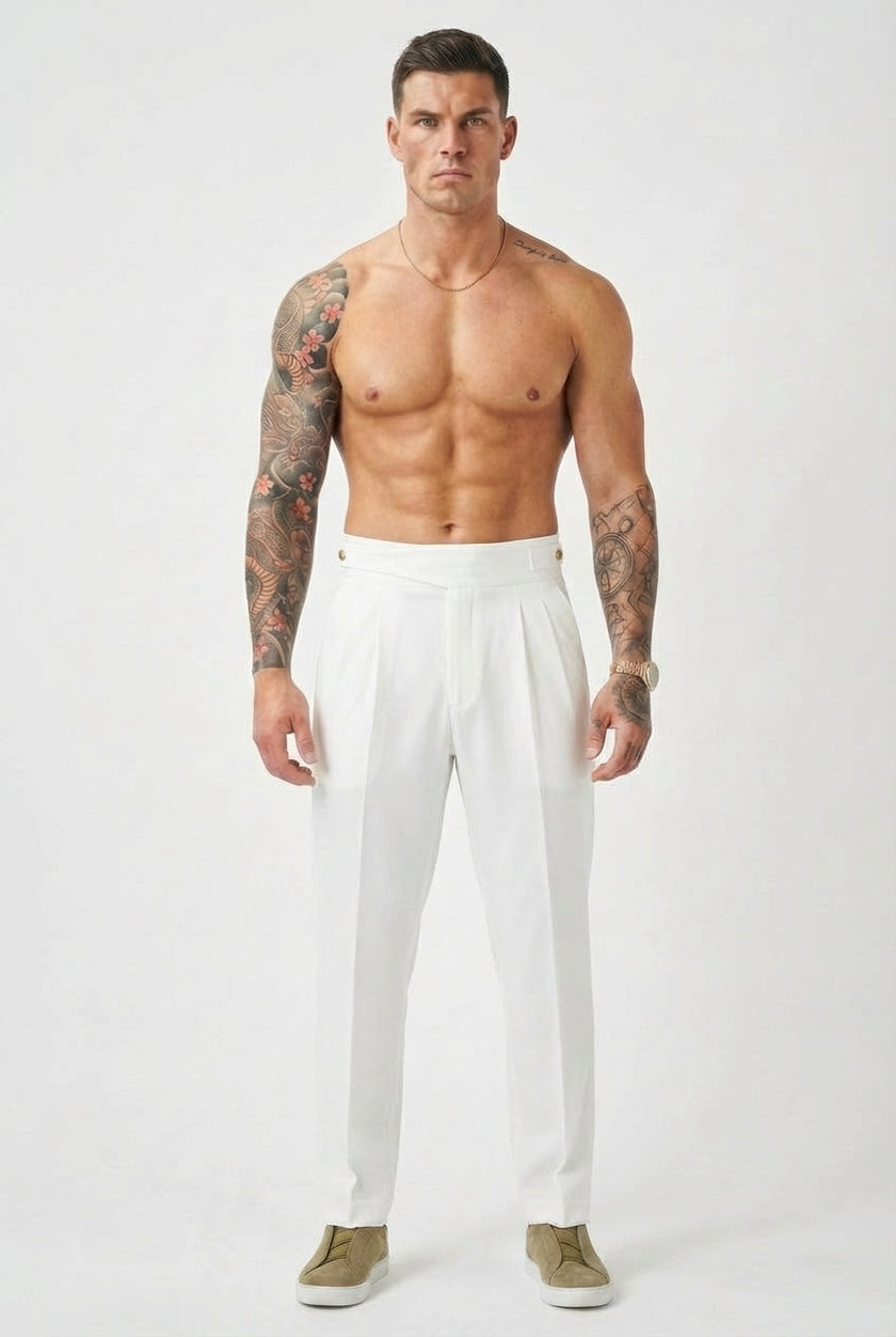 Men's white tailored trousers by FJØRNA, shown on a model, featuring a sleek fit and classic design.