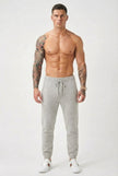 Men's Merino wool trousers in light grey by FJØRNA, featuring a tailored fit and classic design.