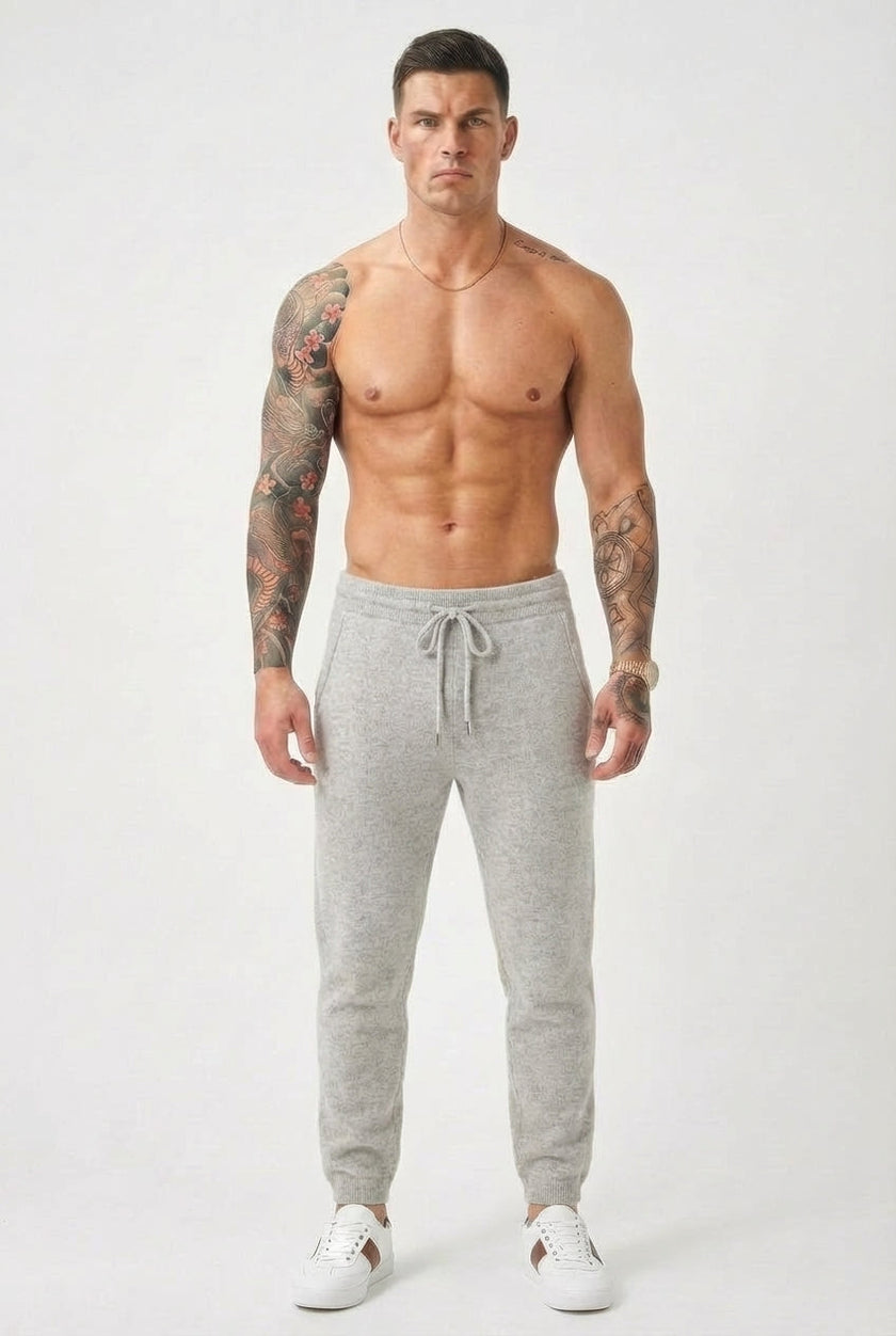 Men's Merino wool trousers in light grey by FJØRNA, featuring a tailored fit and classic design.