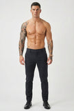 Men's slim-fit blue trousers by FJØRNA, tailored fit with front pockets, shown on a model against a neutral background.