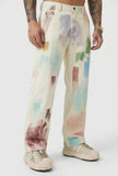 Black painted men's trousers by FJØRNA, featuring a stylish fit and detailed design, shown on a model.