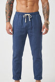 Men's linen tailored trousers by FJØRNA, beige pants with a slim fit and classic design, displayed on a white background.