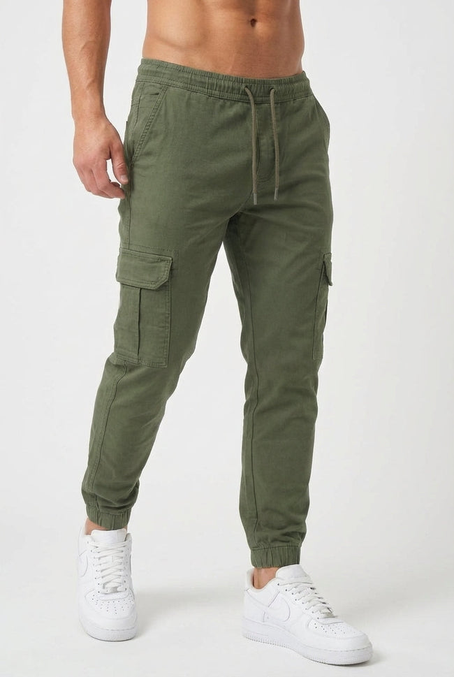 Men's cargo jogger trousers in army green by FJØRNA, featuring a relaxed fit and multiple cargo pockets.